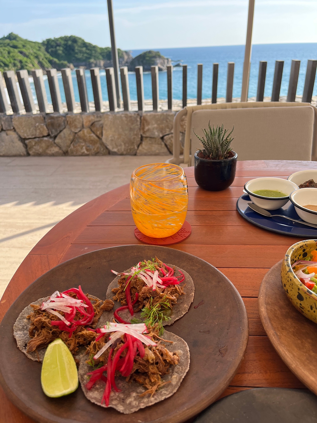 Wild boar tacos on the beachfront, with the perfect view at Nacho restaurant